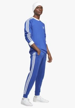 Adidas Originals Stripes Pant Unisex - Tracksuit Bottoms - Semi Lucid Blue -Adidas Shop 01b28080b80a4e29962a44a9ed6b7c51
