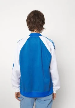 Adidas Originals Sst Tt Os - Training Jacket - Blue Bird 12 Adidas Originals Sst Tt Os - Training Jacket - Blue Bird -Adidas Shop a3383822dc1749028b23c6612ae10ac7