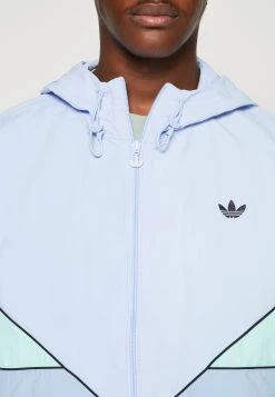 Adidas Originals Unisex - Windbreaker - Blue Dawmbient Sky/Easy Green -Adidas Shop a4cd17ff8596467b81abb84f92a81d74