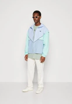 Adidas Originals Unisex - Windbreaker - Blue Dawmbient Sky/Easy Green -Adidas Shop bc9e8e86b6d44be48e4b5edeeb79331a