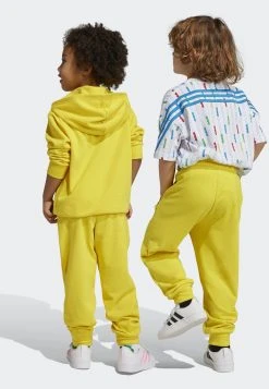 Adidas Sportswear Classic Lego® - Tracksuit Bottoms - Yellow Red -Adidas Shop d261d57ad2fa4881b85dada0f67a8bf4