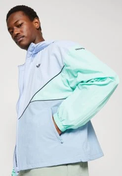 Adidas Originals Unisex - Windbreaker - Blue Dawmbient Sky/Easy Green -Adidas Shop f8dfa0bdcd484cc1a29bfaaa71c94549